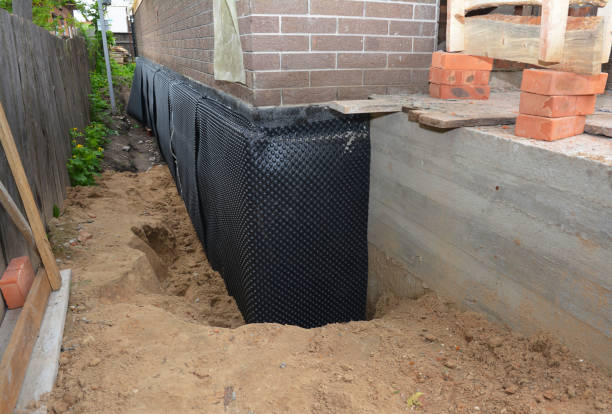 SJ Waterproofing Pros technician performing targeted Crawl Space Encapsulation assessment in Huntington Woods, MI